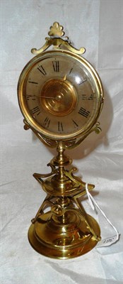 Lot 361 - A brass mantel time piece