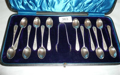 Lot 363 - Twelve teaspoons and tongs cased, 3.3 ounces