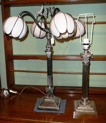 Lot 392 - Plated corinthian column table lamp and another with four pink shades (2)