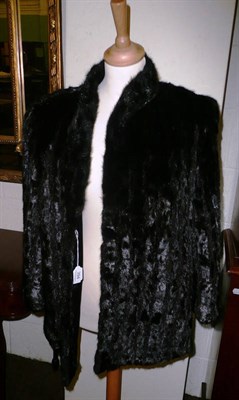 Lot 394 - Black fur jacket bearing a label 'Whiteheads of Montpellier'