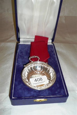 Lot 408 - A silver wine taster, in fitted case