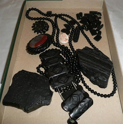 Lot 412 - Whitby jet items and a Whitby jet brooch