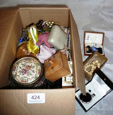 Lot 424 - A box of costume jewellery including bead necklaces, earrings, an onyx brooch stamped '925'...