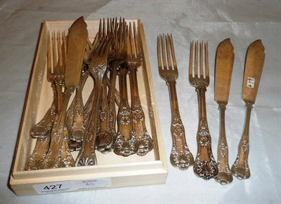 Lot 427 - Nine silver Kings pattern table forks, four silver fish knives and four forks, approx 41oz