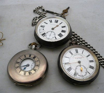 Lot 434 - A silver half hunter pocket watch, two others and two watch chains