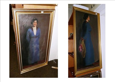 Lot 477 - Two large framed oils of a standing lady in a blue dress