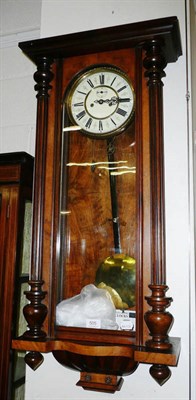 Lot 505 - A Vienna type wall clock with two weights, pendulum and key