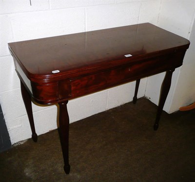 Lot 513 - Plum pudding mahogany tea table