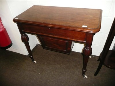 Lot 515 - A Victorian mahogany sewing table with deep slide-out work compartment