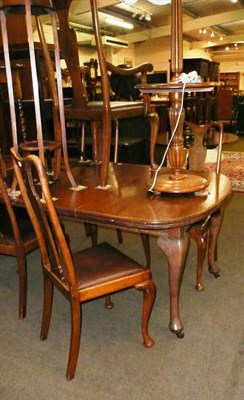 Lot 535 - Oak dining table, five chairs and a standard lamp