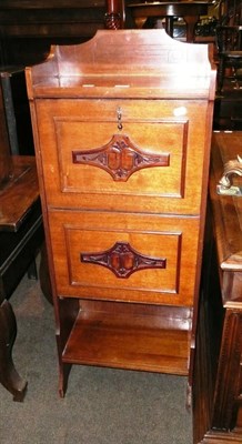 Lot 560 - An early 20th century mahogany music cabinet