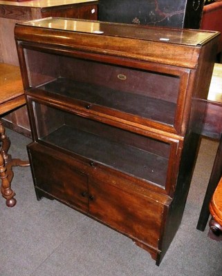 Lot 568 - Wilton stacking glazed two tier bookcase