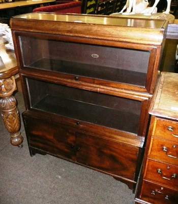 Lot 573 - Wilton stacking glazed two tier bookcase