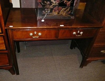 Lot 578 - Two drawer mahogany side table