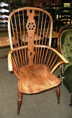 Lot 591 - Ash and elm wheel back Windsor chair