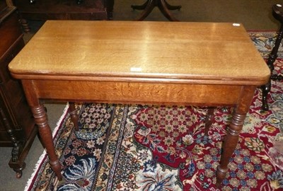 Lot 606 - 19th century oak fold over tea table