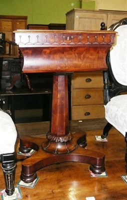 Lot 611 - A Victorian mahogany sewing table