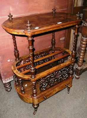 Lot 617 - A Victorian figured walnut Canterbury with table top