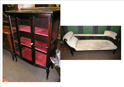 Lot 626 - An Edwardian upholstered chaise longue and a glazed display cabinet