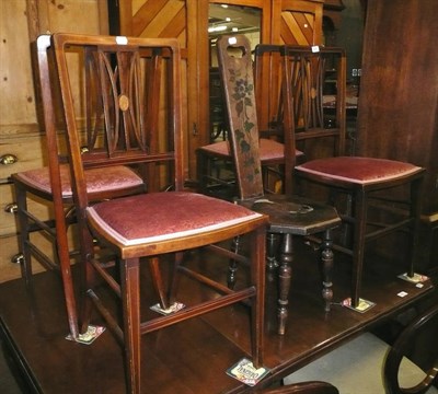 Lot 629 - A set of four Edwardian inlaid mahogany bedroom chairs and a Victorian spinning chair