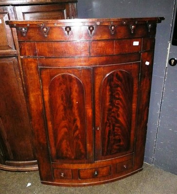 Lot 637 - 19th century mahogany hanging corner cupboard