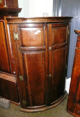 Lot 638 - George III oak corner cupboard, pair of rush seat chairs and a Sutherland table