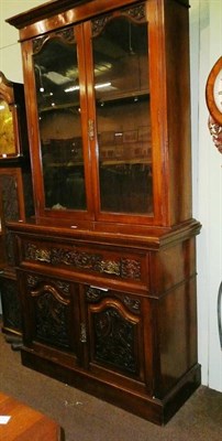 Lot 651 - Late Victorian carved mahogany secretaire bookcase