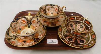 Lot 8 - Two Royal Crown Derby pattern no '4971' tea cups and saucers and a '9021' pattern cup and...