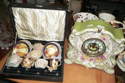 Lot 28 - Pottery mantel clock decorated with flowers and a cased Japanese coffee set