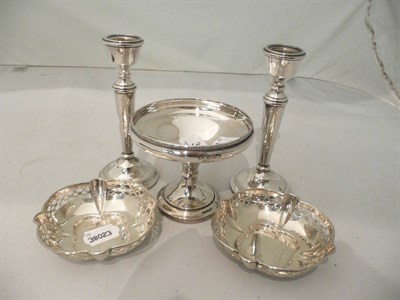 Lot 39 - A pair of small loaded silver candlesticks, a loaded silver pedestal dish and a pair of small...