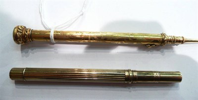 Lot 61 - A gilt metal telescopic pencil by Samson Mordan & Co with amethyst set finial and a gilt metal...