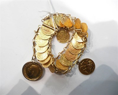 Lot 69 - A gold bracelet with a sovereign, a half sovereign and small gold coins, approximate weight 70g