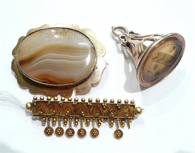 Lot 80 - A bar brooch, a banded agate brooch and a fob