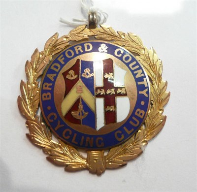 Lot 92 - A 9ct gold medal enamelled for 'Bradford & County Cycling Club', 12g