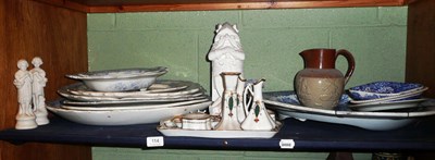 Lot 114 - Shelf of ceramics including blue and white meat dishes, dressing table set, stoneware jug etc.