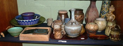 Lot 115 - Shelf of studio pottery, including tiles, Danish bowl etc