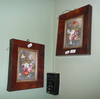 Lot 118 - A pair of 19th century porcelain plaques painted with floral still lives, in rosewood frames,...