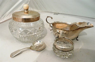 Lot 131 - Silver sauce boat, caddy spoon, Walker & Hall jar and cover and salt