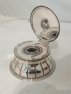 Lot 136 - A late Victorian silver inkwell with glass liner and base, London 1898