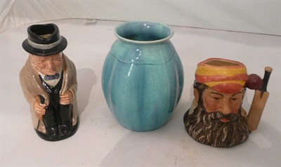 Lot 160 - A Royal Doulton Winston Churchill toby jug and a Royal Doulton W.G.Grace small character jug, a...