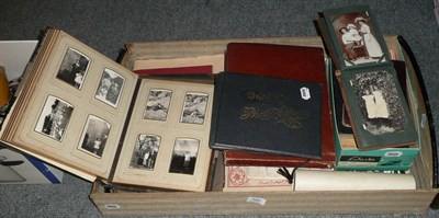 Lot 192 - A quantity of photographs and postcards, scraps etc in seven albums and loose, a small quantity...