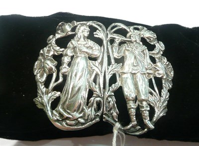 Lot 196 - A late Victorian silver belt clasp, pierced and cast with a pair of 17th century lovers, Birmingham