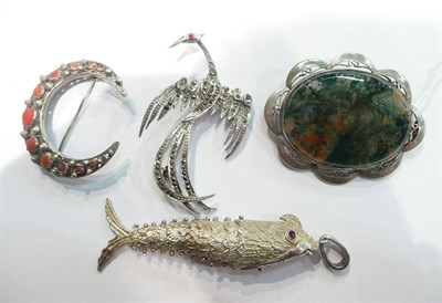 Lot 202 - A moss agate brooch, two brooches and a fish pendant