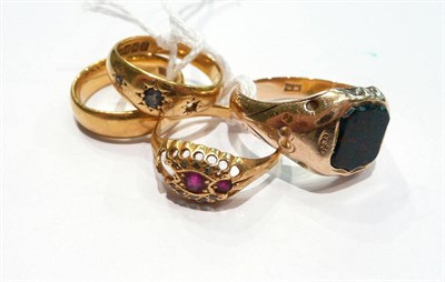 Lot 216 - A gentleman's 15ct gold and bloodstone signet ring, a 22ct gold wedding band and two 18ct gold...