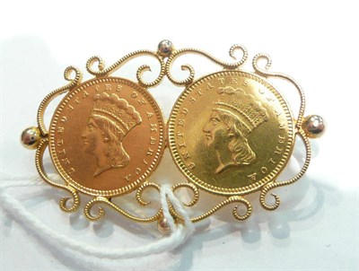 Lot 219 - Double dollar coin brooch