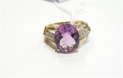 Lot 221 - An amethyst and diamond dress ring