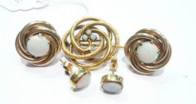 Lot 226 - An opal set brooch and two pairs of earrings