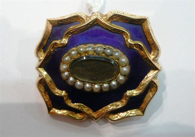 Lot 231 - A Victorian memorial brooch, a central picture panel with enclosed plaited hair within a border...