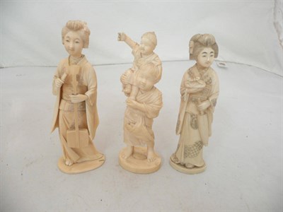 Lot 269 - A Japanese one piece ivory carving of two boys and two Japanese sectional Ivory figures of...