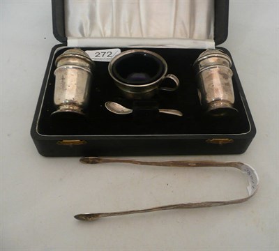 Lot 272 - A three piece condiment set and a pair of sugar tongs